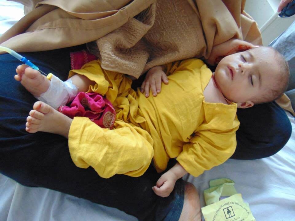 Portrait — mother and child at MCHC Swat