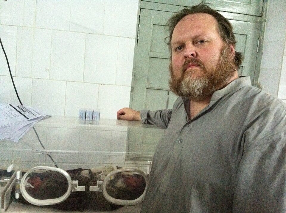 Todd Shea in the field — portrait, working, not posed